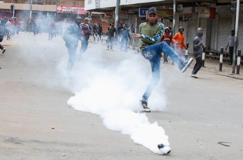  Police fire tear gas during clashes with protesters in Nairobi