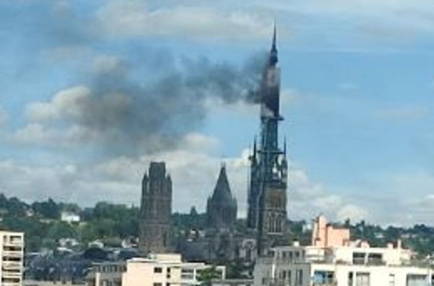  Spire of famous French cathedral on fire