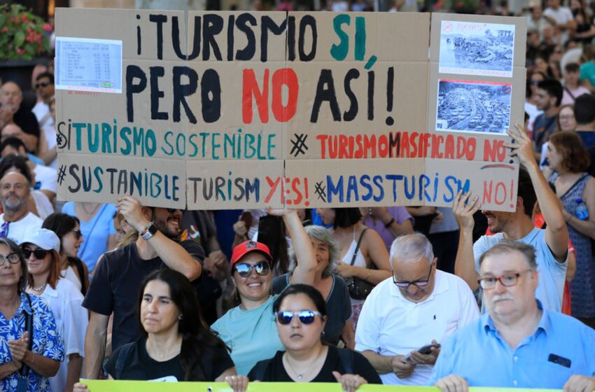 ‘your-paradise,-our-nightmare’:-thousands-attend-anti-tourism-protest-in-majorca