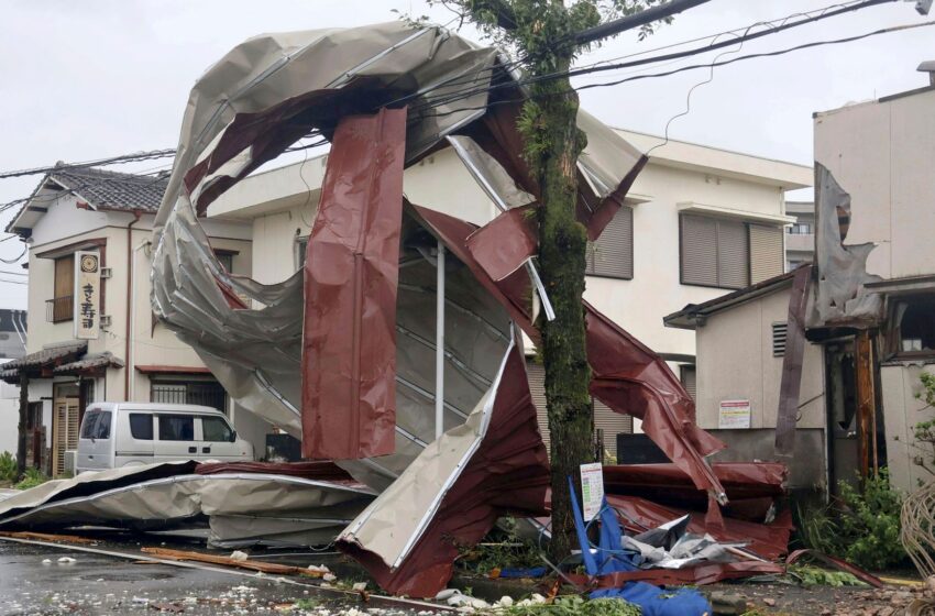  At least three dead as typhoon hits Japan and raises fears of flooding and landslides