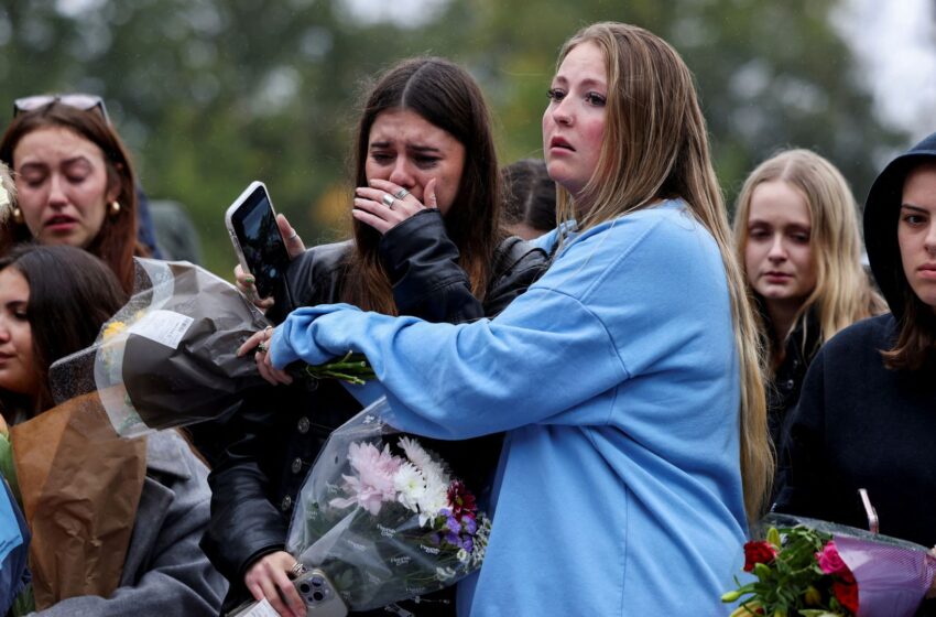  Tearful Liam Payne fans comfort one another at London vigil