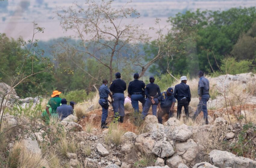  Body pulled from mine after police cut off supplies to illegal miners pinned underground