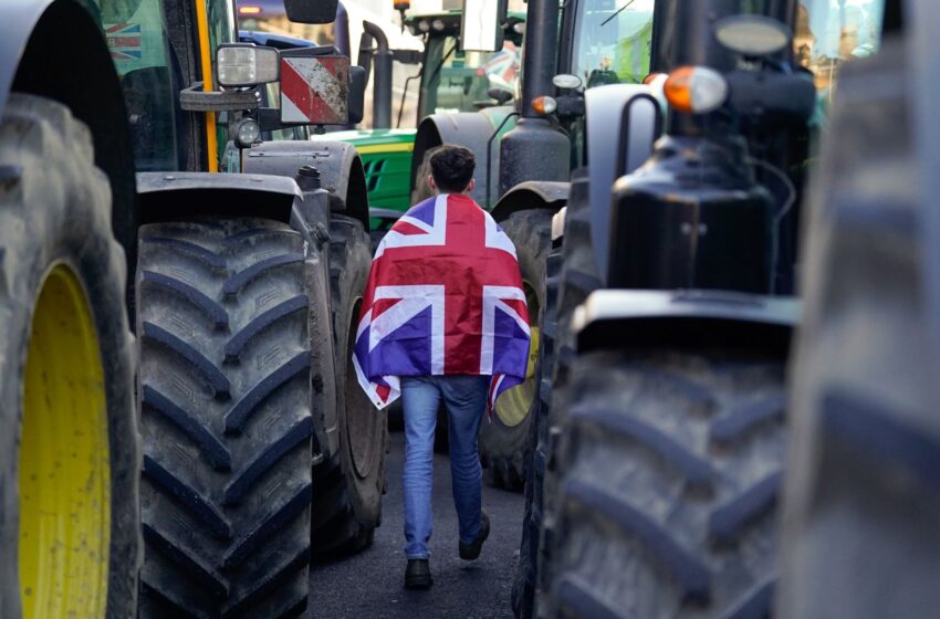  Environment secretary says ‘sorry’ to farmers over tax ‘shock’ – as noisy protest impacts speech