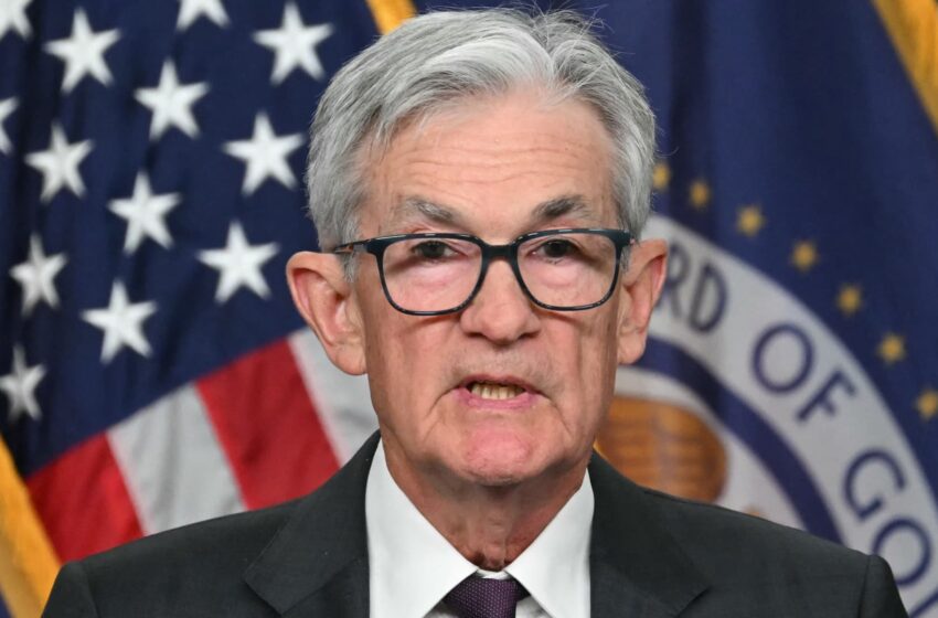 fed-holds-rates-steady,-takes-less-confident-view-on-inflation