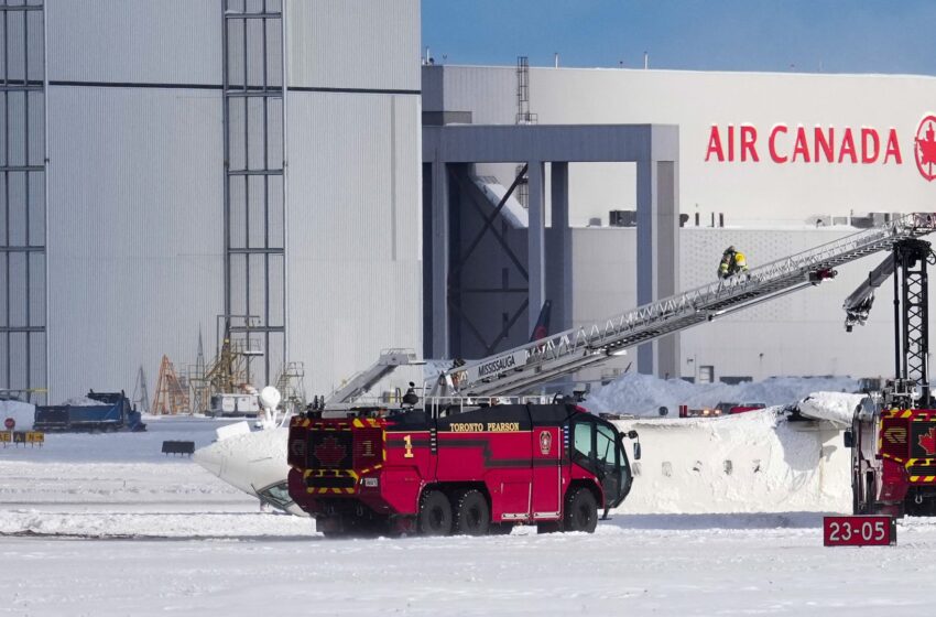  Delta plane comes to rest upside down after flipping over while landing on Toronto runway